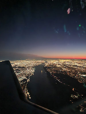 Skyline at night from plane
